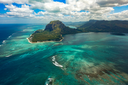 unsplash_WV4B_aVj0aQ_helicopter island.webp